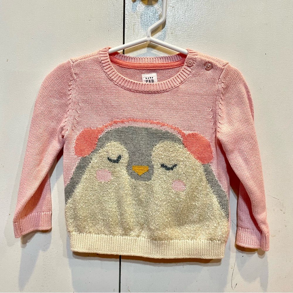 Gap factory sweater with penguin in ear miffs. Pink. Brand new with tag 12-18m.